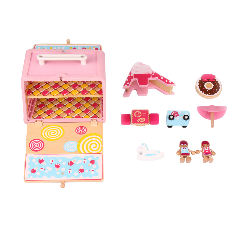 Candy House GoBox pieces laid out with slide, cart, umbrella, furniture and miniature figures