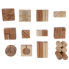Assorted bamboo building blocks in various shapes and sizes displayed in a flat lay, showing natural grain patterns.