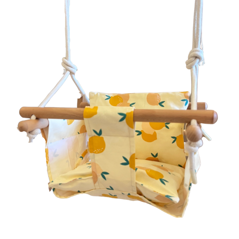 Lucky Lemon fabric swing with large yellow lemon print and wooden support bars