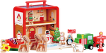 Santa’s Workshop wooden play set arranged as a Christmas small-world scene with characters and vehicles