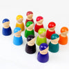 Colorful wooden peg people on a white background