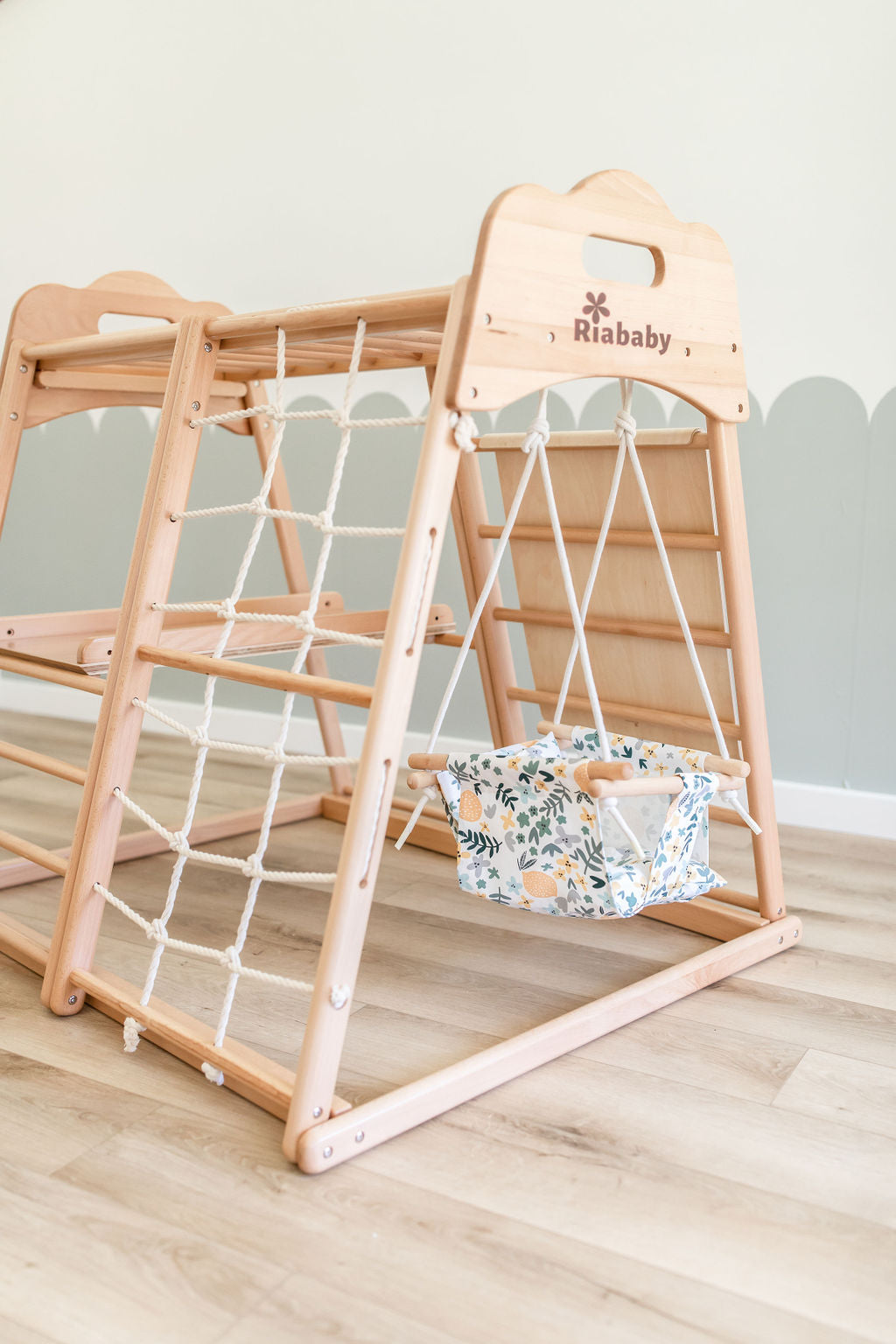 Floral lemon-print swing attached to a Koala playhouse
