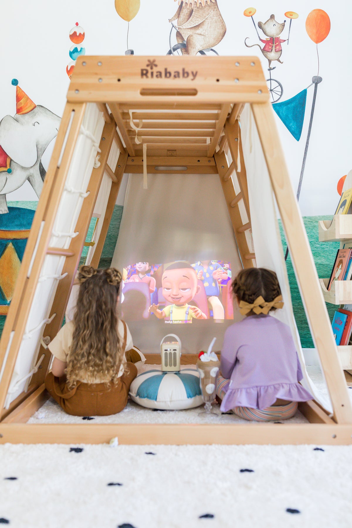 Children playing around a Kangaroo Playhouse set up as a cubby with the Glamping Tent