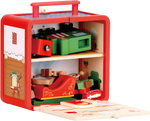 Santa’s Workshop GoBox opened to show the wooden interior and stored Christmas play pieces