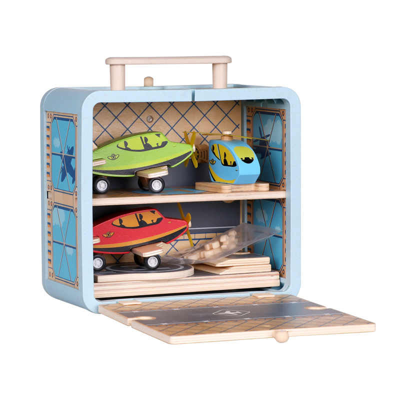 Wooden Airport GoBox opened to show the aircraft and airport play pieces stored inside