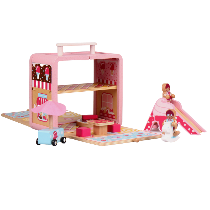 Candy House play scene arranged with slide, ice cream cart, figures and pretend-play accessories