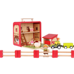 Wooden Farm House play scene arranged with barn, tractor, trailer, farmers, animals and wooden fences