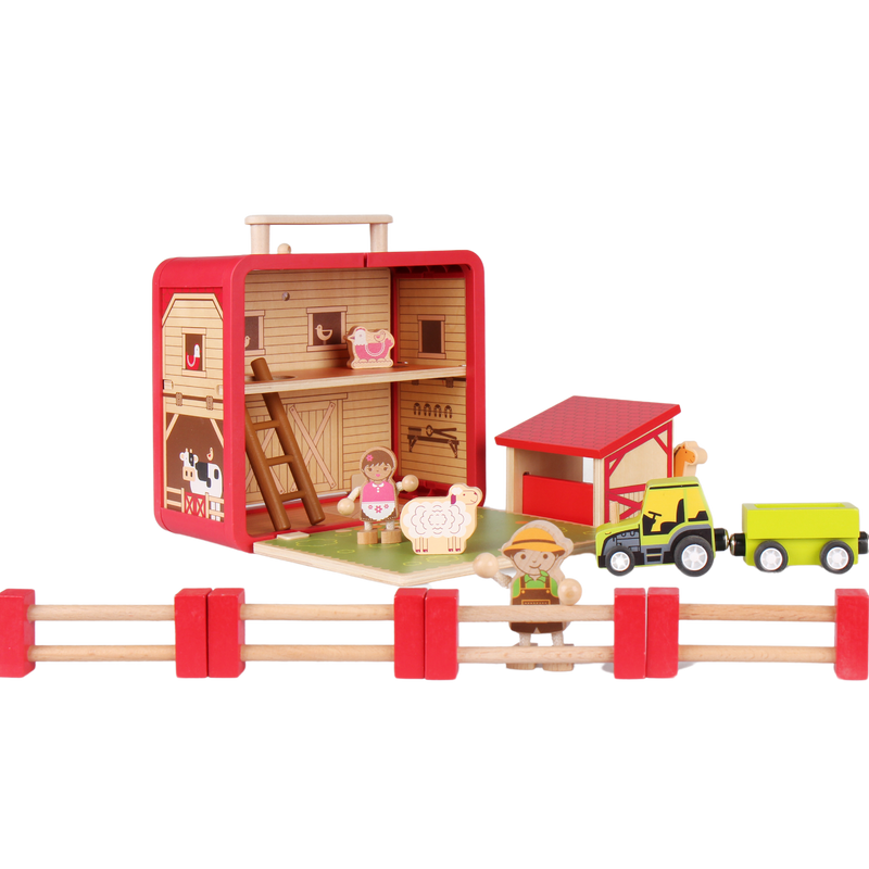 Wooden Farm House play scene arranged with barn, tractor, trailer, farmers, animals and wooden fences