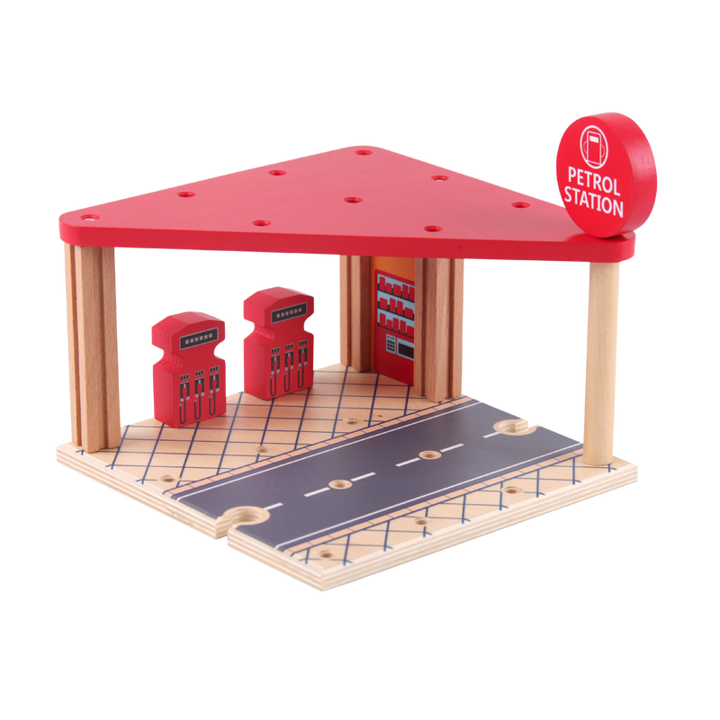Close view of the wooden petrol station with fuel pumps, cars and roadway