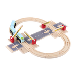 Road and rail junction play set showing lifting barriers, connectors and wooden track pieces