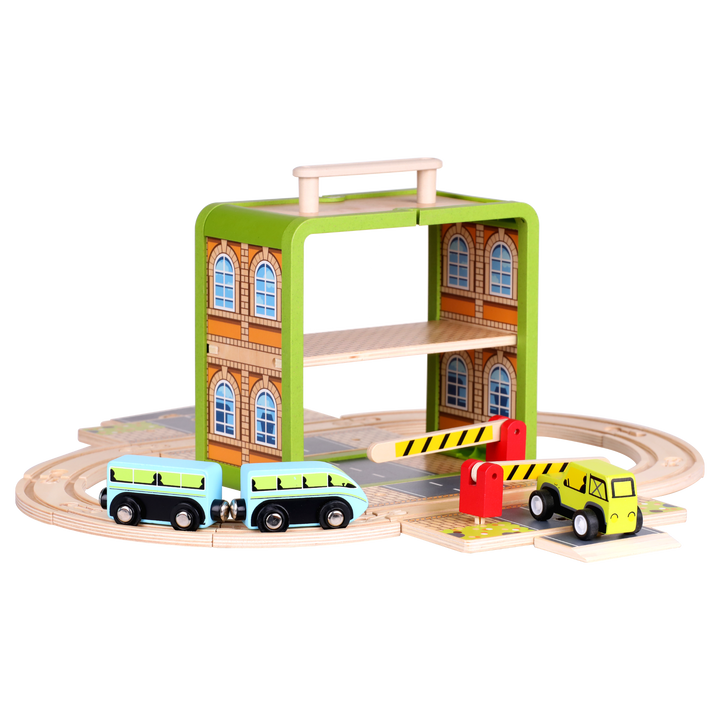 Wooden Train Set GoBox opened with railway tracks, train carriages and road pieces arranged for play