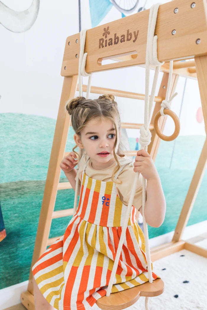Child enjoying the Kangaroo wooden playhouse