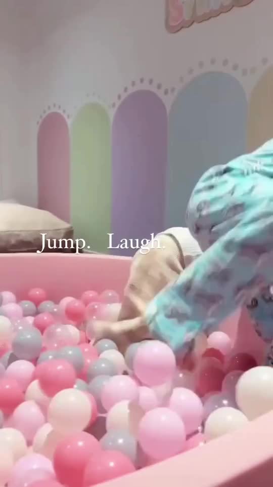 Children playing in the pink 130cm round ball pit