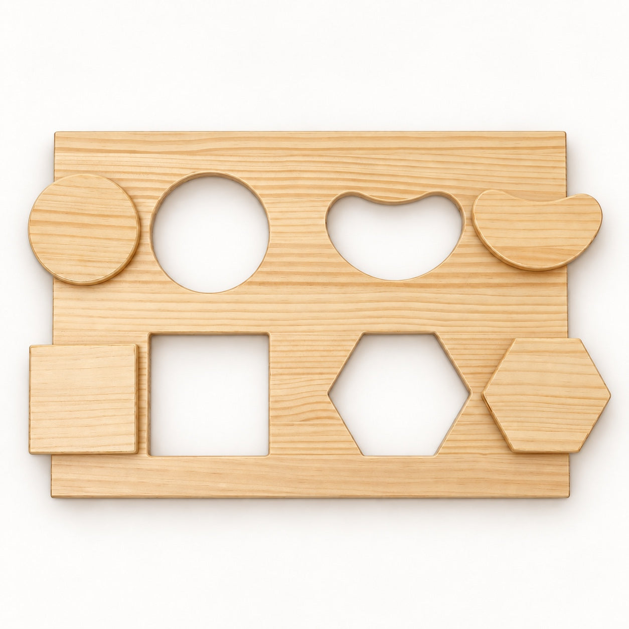 Wooden shape-sorting panel with its four matching pieces